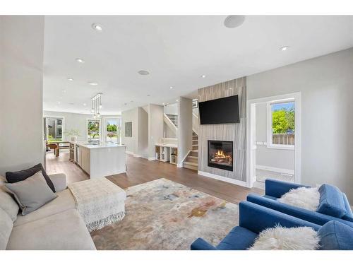 2050 49 Avenue Sw, Calgary, AB - Indoor Photo Showing Living Room With Fireplace