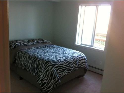 3110-604 8 Street Sw, Airdrie, AB - Indoor Photo Showing Bedroom