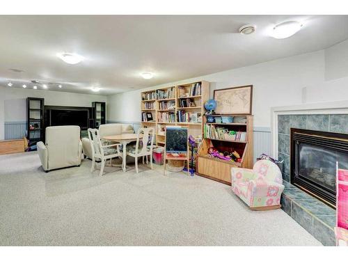 24 Foxwell Road Se, Calgary, AB - Indoor With Fireplace