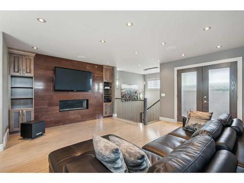 609 54 Avenue Sw, Calgary, AB - Indoor Photo Showing Living Room With Fireplace
