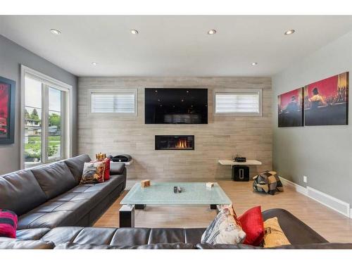 609 54 Avenue Sw, Calgary, AB - Indoor Photo Showing Living Room With Fireplace