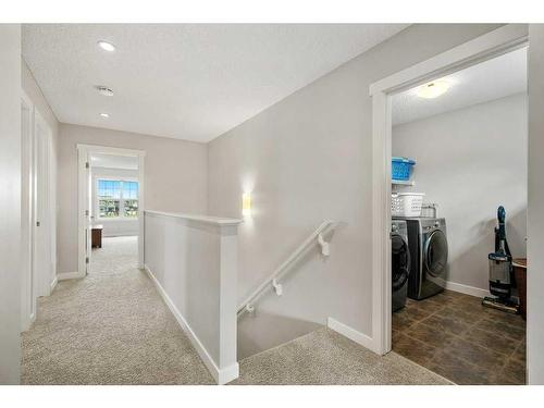 130 Reunion Landing Nw, Airdrie, AB - Indoor Photo Showing Bedroom