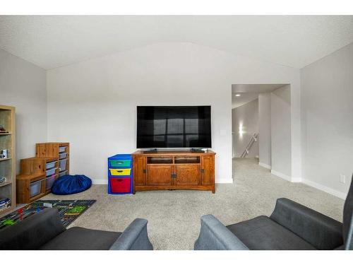 130 Reunion Landing Nw, Airdrie, AB - Indoor Photo Showing Bedroom