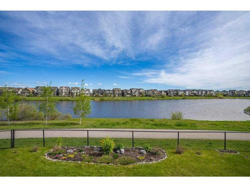 130 Reunion Landing Nw, Airdrie, AB - Outdoor With Body Of Water With View