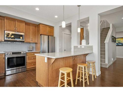 130 Reunion Landing Nw, Airdrie, AB - Indoor Photo Showing Kitchen With Upgraded Kitchen