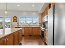 130 Reunion Landing Nw, Airdrie, AB  - Indoor Photo Showing Kitchen 