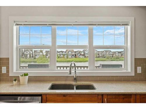 130 Reunion Landing Nw, Airdrie, AB - Indoor Photo Showing Kitchen With Double Sink