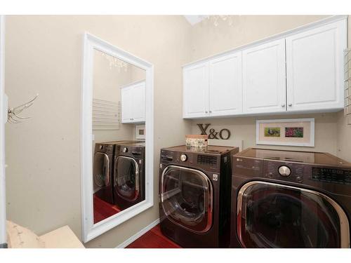 131 Chapalina Crescent Se, Calgary, AB - Indoor Photo Showing Laundry Room