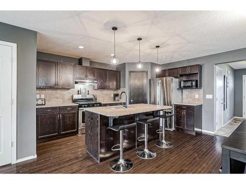 16 Cranston Gate Se, Calgary, AB - Indoor Photo Showing Kitchen With Stainless Steel Kitchen With Upgraded Kitchen