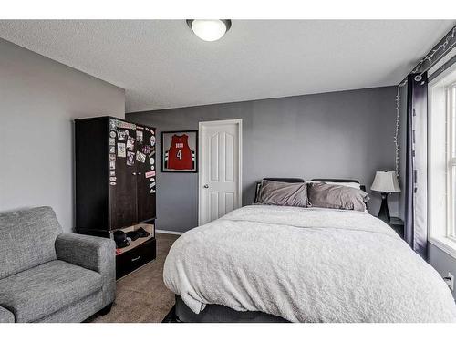 16 Cranston Gate Se, Calgary, AB - Indoor Photo Showing Bedroom
