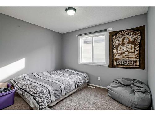 16 Cranston Gate Se, Calgary, AB - Indoor Photo Showing Bedroom
