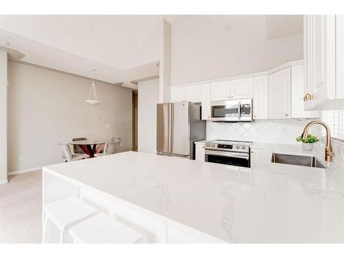 2312-7451 Springbank Boulevard Sw, Calgary, AB - Indoor Photo Showing Kitchen With Upgraded Kitchen