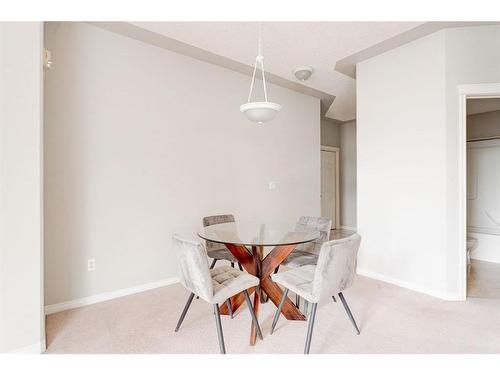 2312-7451 Springbank Boulevard Sw, Calgary, AB - Indoor Photo Showing Dining Room