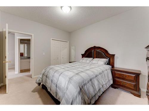 2312-7451 Springbank Boulevard Sw, Calgary, AB - Indoor Photo Showing Bedroom