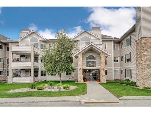 2312-7451 Springbank Boulevard Sw, Calgary, AB - Outdoor With Balcony With Facade