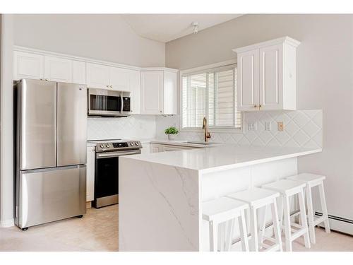 2312-7451 Springbank Boulevard Sw, Calgary, AB - Indoor Photo Showing Kitchen