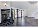 503-5660 23 Avenue Ne, Calgary, AB  - Indoor Photo Showing Living Room With Fireplace 