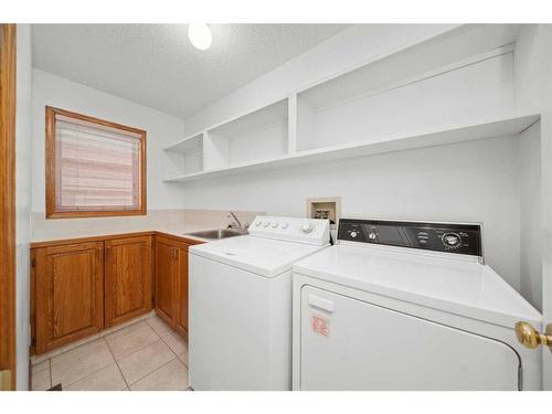 91 Macewan Meadow Way Nw, Calgary, AB - Indoor Photo Showing Laundry Room