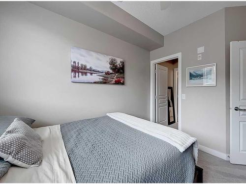 208-22 Panatella Road Nw, Calgary, AB - Indoor Photo Showing Bedroom