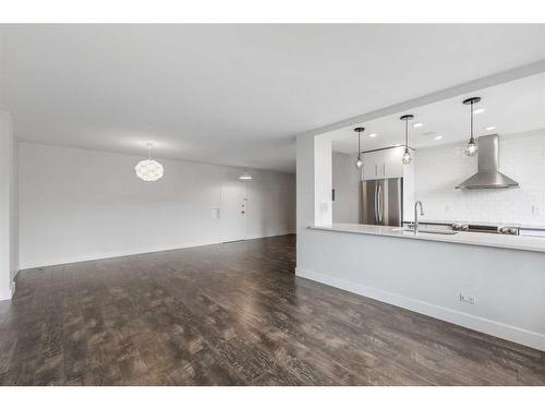 403-3316 Rideau Place Sw, Calgary, AB - Indoor Photo Showing Kitchen With Upgraded Kitchen