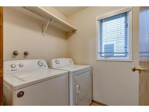 17 Sundown Close Se, Calgary, AB - Indoor Photo Showing Laundry Room