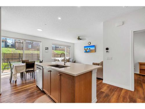 244 Lucas Way Nw, Calgary, AB - Indoor Photo Showing Kitchen With Double Sink