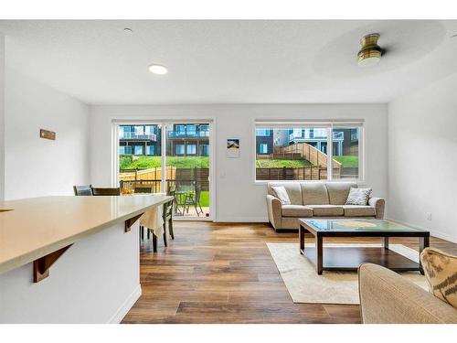 244 Lucas Way Nw, Calgary, AB - Indoor Photo Showing Living Room