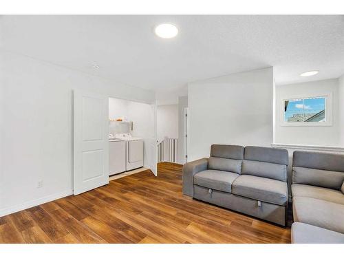 244 Lucas Way Nw, Calgary, AB - Indoor Photo Showing Living Room