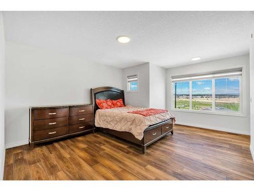 244 Lucas Way Nw, Calgary, AB - Indoor Photo Showing Bedroom