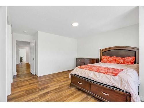 244 Lucas Way Nw, Calgary, AB - Indoor Photo Showing Bedroom