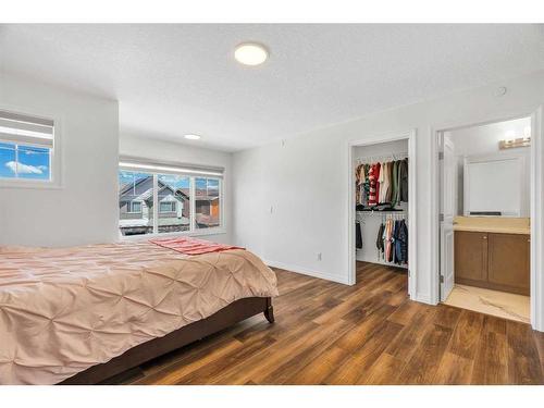 244 Lucas Way Nw, Calgary, AB - Indoor Photo Showing Bedroom