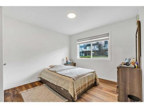 244 Lucas Way Nw, Calgary, AB - Indoor Photo Showing Bedroom