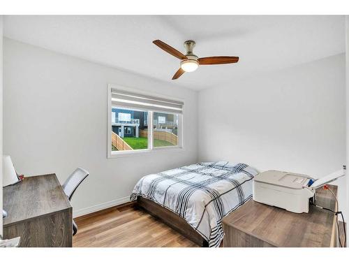 244 Lucas Way Nw, Calgary, AB - Indoor Photo Showing Bedroom