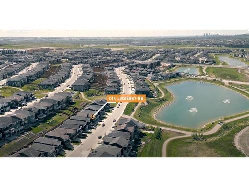 244 Lucas Way Nw, Calgary, AB - Outdoor With Body Of Water With View