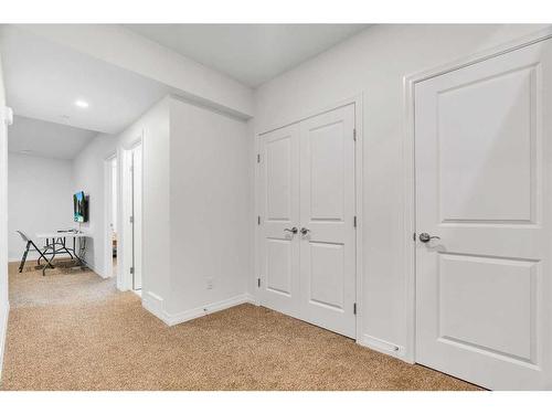 244 Lucas Way Nw, Calgary, AB - Indoor Photo Showing Other Room