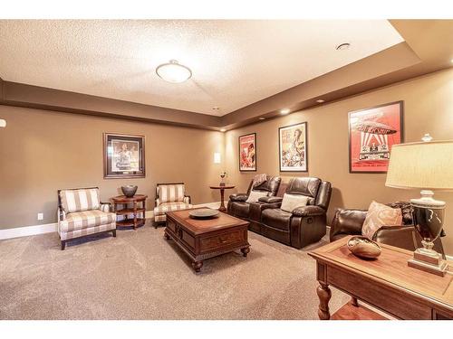 214 Artesia Gate, Heritage Pointe, AB - Indoor Photo Showing Living Room