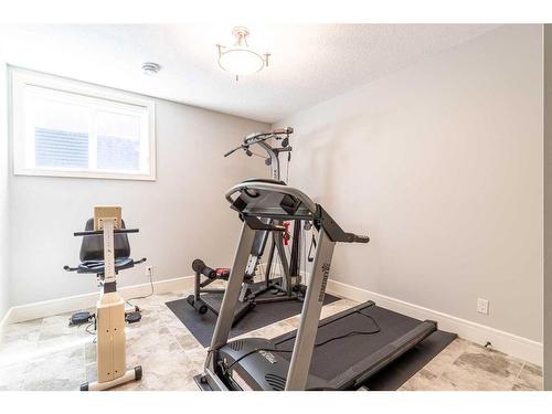 214 Artesia Gate, Heritage Pointe, AB - Indoor Photo Showing Gym Room