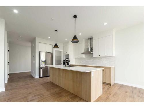 138 Belmont Passage Sw, Calgary, AB - Indoor Photo Showing Kitchen With Stainless Steel Kitchen With Upgraded Kitchen