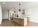 138 Belmont Passage Sw, Calgary, AB  - Indoor Photo Showing Kitchen With Stainless Steel Kitchen With Upgraded Kitchen 