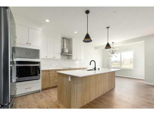 138 Belmont Passage Sw, Calgary, AB - Indoor Photo Showing Kitchen With Upgraded Kitchen