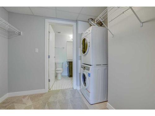 1609-930 6 Avenue Sw, Calgary, AB - Indoor Photo Showing Laundry Room