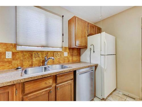 1511 22 Avenue Nw, Calgary, AB - Indoor Photo Showing Kitchen With Double Sink