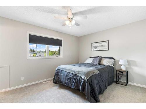 626 Hidden Vale Place Nw, Calgary, AB - Indoor Photo Showing Bedroom