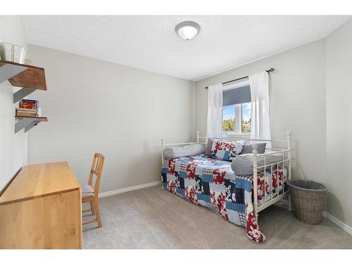 626 Hidden Vale Place Nw, Calgary, AB - Indoor Photo Showing Bedroom