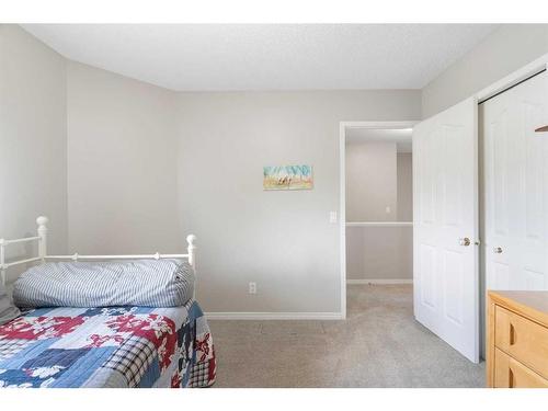 626 Hidden Vale Place Nw, Calgary, AB - Indoor Photo Showing Bedroom