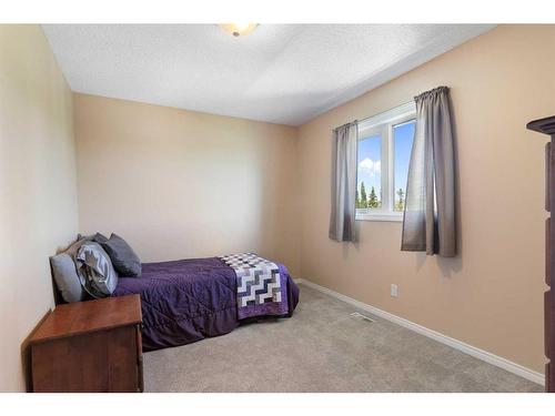 626 Hidden Vale Place Nw, Calgary, AB - Indoor Photo Showing Bedroom