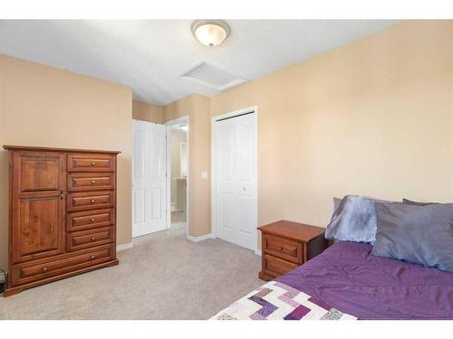 626 Hidden Vale Place Nw, Calgary, AB - Indoor Photo Showing Bedroom