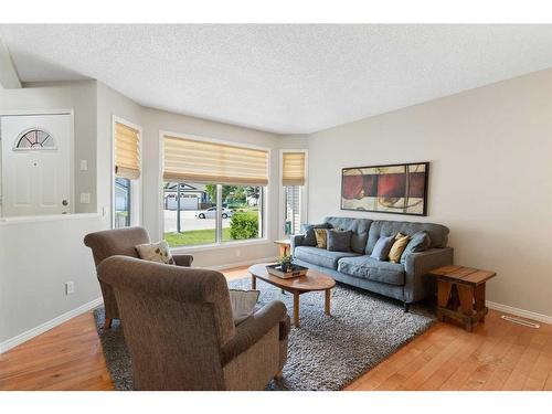 626 Hidden Vale Place Nw, Calgary, AB - Indoor Photo Showing Living Room