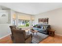 626 Hidden Vale Place Nw, Calgary, AB  - Indoor Photo Showing Living Room 