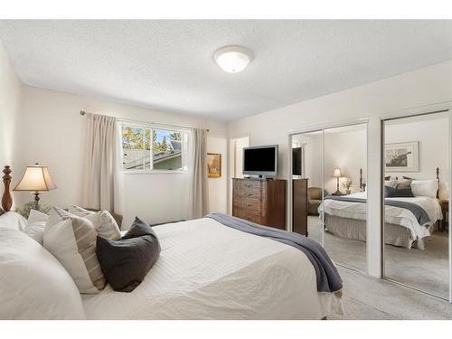 143 Brookgreen Drive Sw, Calgary, AB - Indoor Photo Showing Bedroom